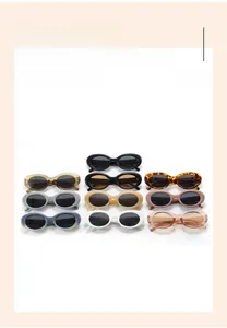 Multicolor collection of vintage oval sunglasses with various frames in a matrix layout