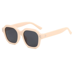 Hip-hop thick frame polygonal sunglasses in beige with metal studs and dark lenses