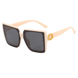 Chic quadratische Oversize-Sonnenbrille in Cremeweiß und Schwarz mit Gold-Akzenten