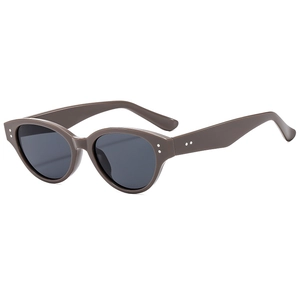 Classic cat-eye sunglasses with dark brown frames and vintage silver rivet accents