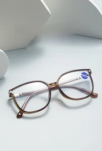 Detailed macro view of tortoiseshell reading glasses with +1.00 strength and blue light lens