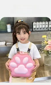 Detailed view of kids pink cat paw backpack with 3D EVA hard shell and adjustable straps