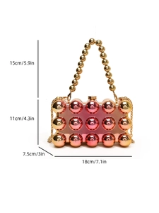 Pink and gold gradient acrylic clutch with sphere textures and chain strap dimensions