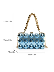 Detailed view of blue acrylic evening bag with dimensions 18x11x7.5cm and beaded handle