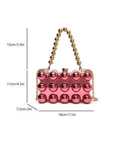 Detailed view of pink acrylic clutch with gold bead handle and dimensions display