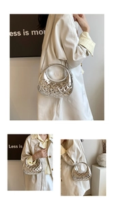 Detail of silver diamond lattice evening bag showing the round handle and metal chain