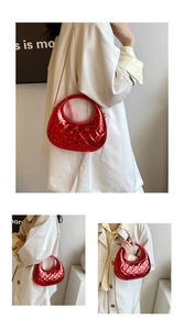 Detail view of red quilted acrylic evening bag with metallic finish and gold chain strap