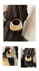 Detail of metallic gold quilted handbag showing round handle and crossbody chain