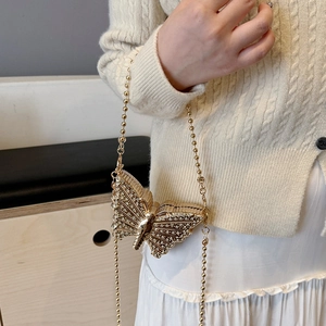 Elegante bolso de fiesta mariposa dorado con cristales brillantes y cadena de cuentas