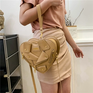Khaki heart-shaped biker jacket style handbag with metal zippers and rivets