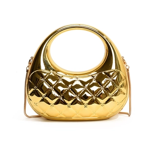 Glossy gold acrylic box bag with quilted diamond pattern and elegant metal chain