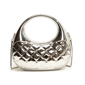 Futuristic liquid silver quilted acrylic clutch bag with a sleek round cutout handle