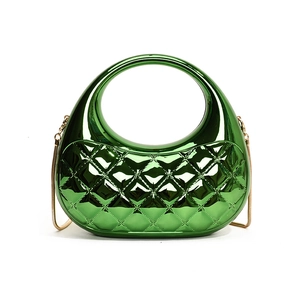 Emerald green acrylic box bag with diamond lattice pattern and golden chain strap