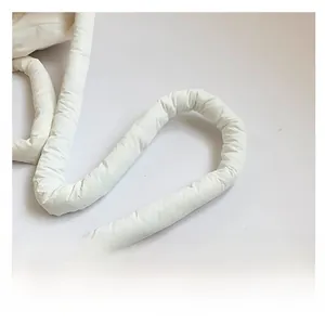 Detailed close-up of padded white nylon shoulder strap with soft quilted texture