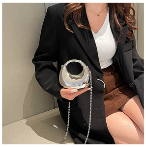 Mini silver mirror evening bag with metallic chain strap and rounded handle