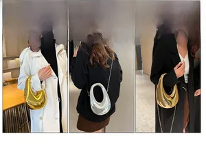 Detail der spiegelbeschichteten ovalen Handtasche mit vielseitigen Kettenriemen-Tragestilen