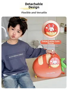 Close-up of the detachable bunny coin purse on the orange carrot-shaped kid backpack