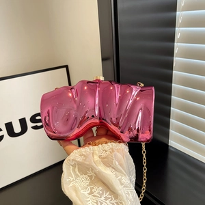 Modern metallic pink clutch bag with 3D wavy pleat design and gold chain strap