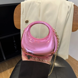 Pink metallic crescent mini bag with gold chain strap and top handle for women