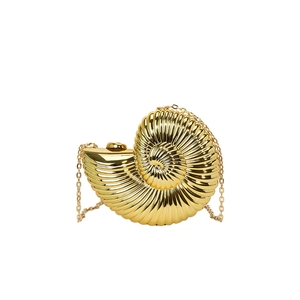 Glossy gold nautilus shell evening clutch bag with delicate metal chain strap