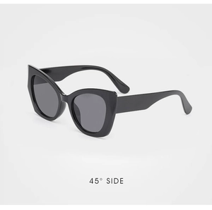 Detailed 45-degree side view of black cat-eye sunglasses with modern sharp edges