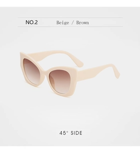 Detail of beige cat-eye sunglasses with gradient brown lenses from a 45-degree angle side view