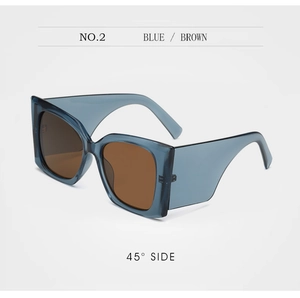 Detailed 45-degree side view of blue thick frame sunglasses with brown lenses
