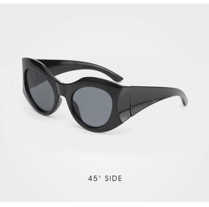 Detail view of bold black wavy frame sunglasses showing 45-degree side structure