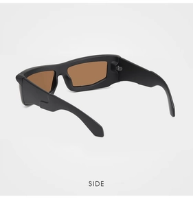 Side view of matte black wrap-around sunglasses with wide temples and brown lenses