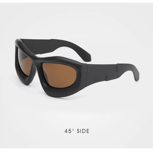 Macro side view of black matte oversized wrap sunglasses with brown tinted lenses