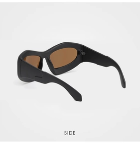 Side view of matte black oversized sunglasses with brown polarized lenses and wide temples