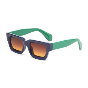 Lunettes de soleil rétro avec monture bleu foncé et branches vert fluo contrastées