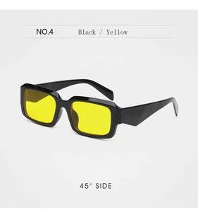 Vue latérale détaillée à 45 degrés de lunettes de soleil rectangulaires noires à verres jaunes