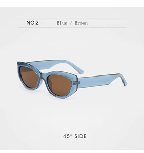 Blue translucent cat-eye sunglasses with dark brown lenses shown from a 45-degree angle