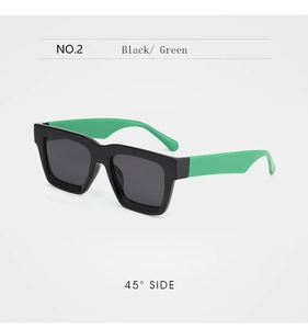Side view of square sunglasses with black frame and contrasting green temples