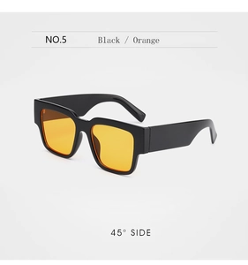 Close-up 45-degree side view of black square frame sunglasses with orange lenses
