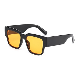 Chic hip-hop square sunglasses with black thick frames and vibrant orange tinted lenses