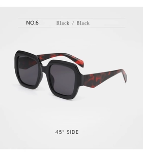 Detailed 45-degree side view of oversized square sunglasses with tortoiseshell temples