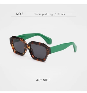 Vue latérale à 45 degrés de lunettes de soleil écaillées avec branches vert vif