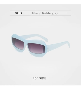 Detailed 45-degree side view of blue thick frame sunglasses with gradient gray lenses