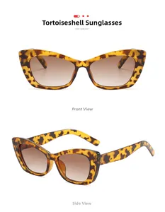 Detail view of cat eye sunglasses with tortoise shell frame and gradient brown lenses