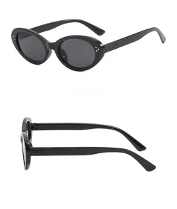Side view of retro oval sunglasses with triple-dot metal rivets and sleek black frames