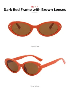 Close-up of vintage oval burgundy sunglasses with tea lenses and silver triple dot rivets