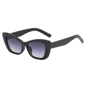 Retro cat eye sunglasses with glossy black frames and purple-grey gradient lenses