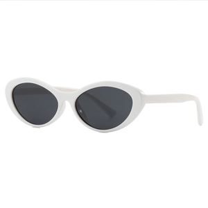 Retro white oval cat-eye sunglasses with dark lenses for women, stylish vintage frames