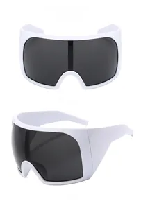 Close-up of white wide-frame futuristic sunglasses with grey lenses and geometric side arms