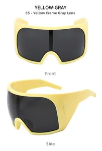 Detailed front and side views of futuristic yellow oversized flat top sunglasses with gray lenses