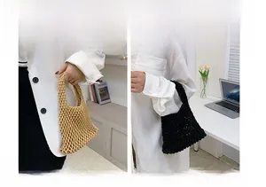 Detail view of khaki and black woven cotton bags showing handheld and wrist-carry styles