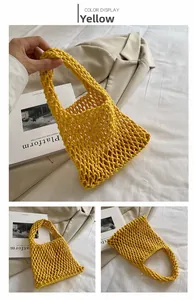 Detail view of yellow hand-woven cotton rope mesh bag with hollow net texture