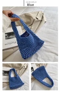 Detail of blue handmade woven cotton rope handbag with intricate mesh texture and handles
